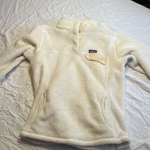 White Patagonia pullover.